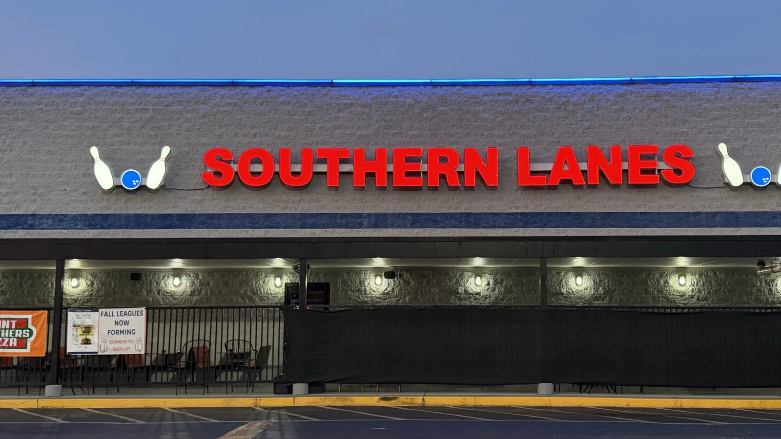 Southern Lanes Bowling Green storefront with red illuminated letters and bowling pin signs
